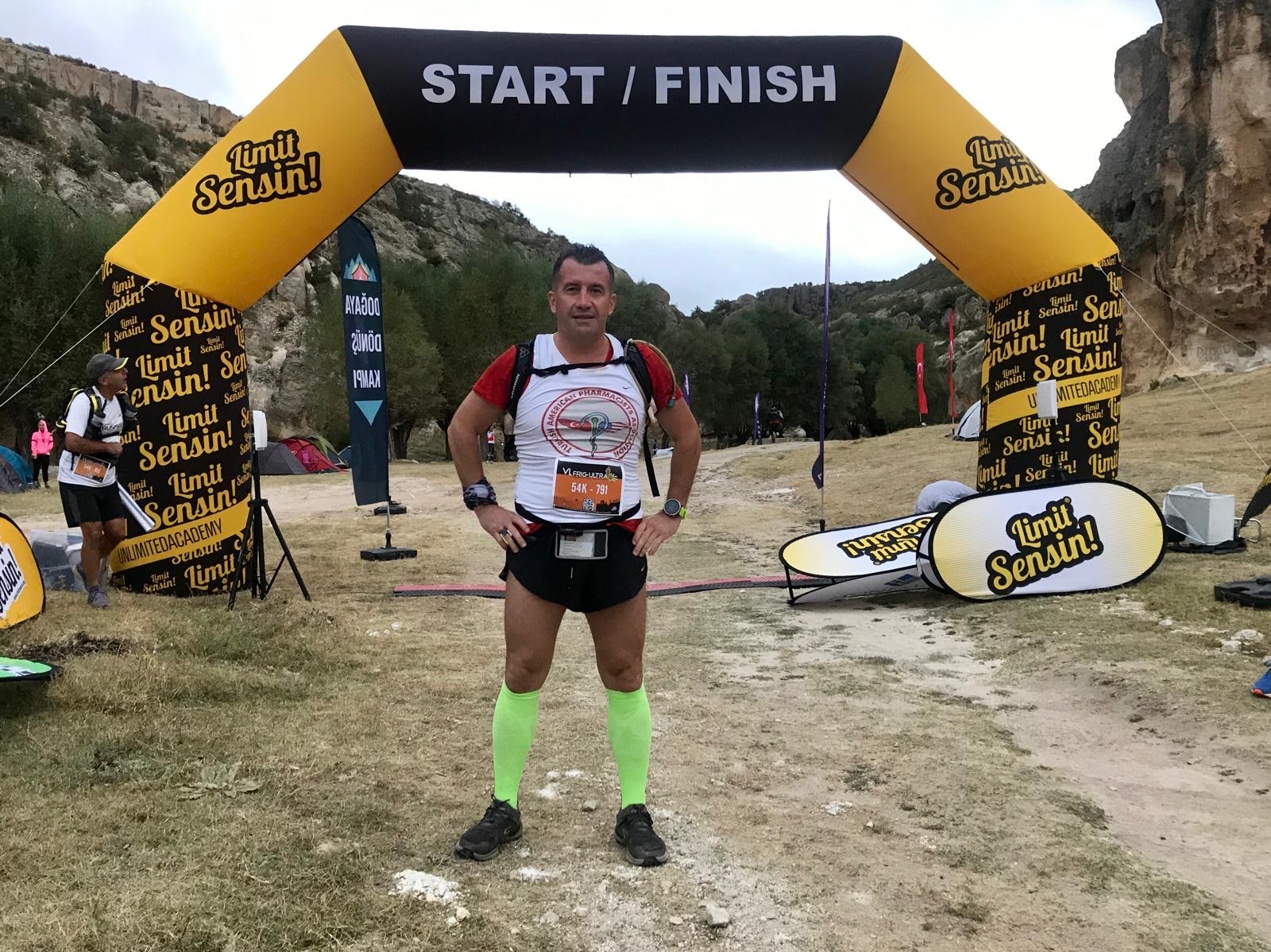 Erden Giritli at the Cappadocia Ultra Trail finish line, reflecting his running coach experience