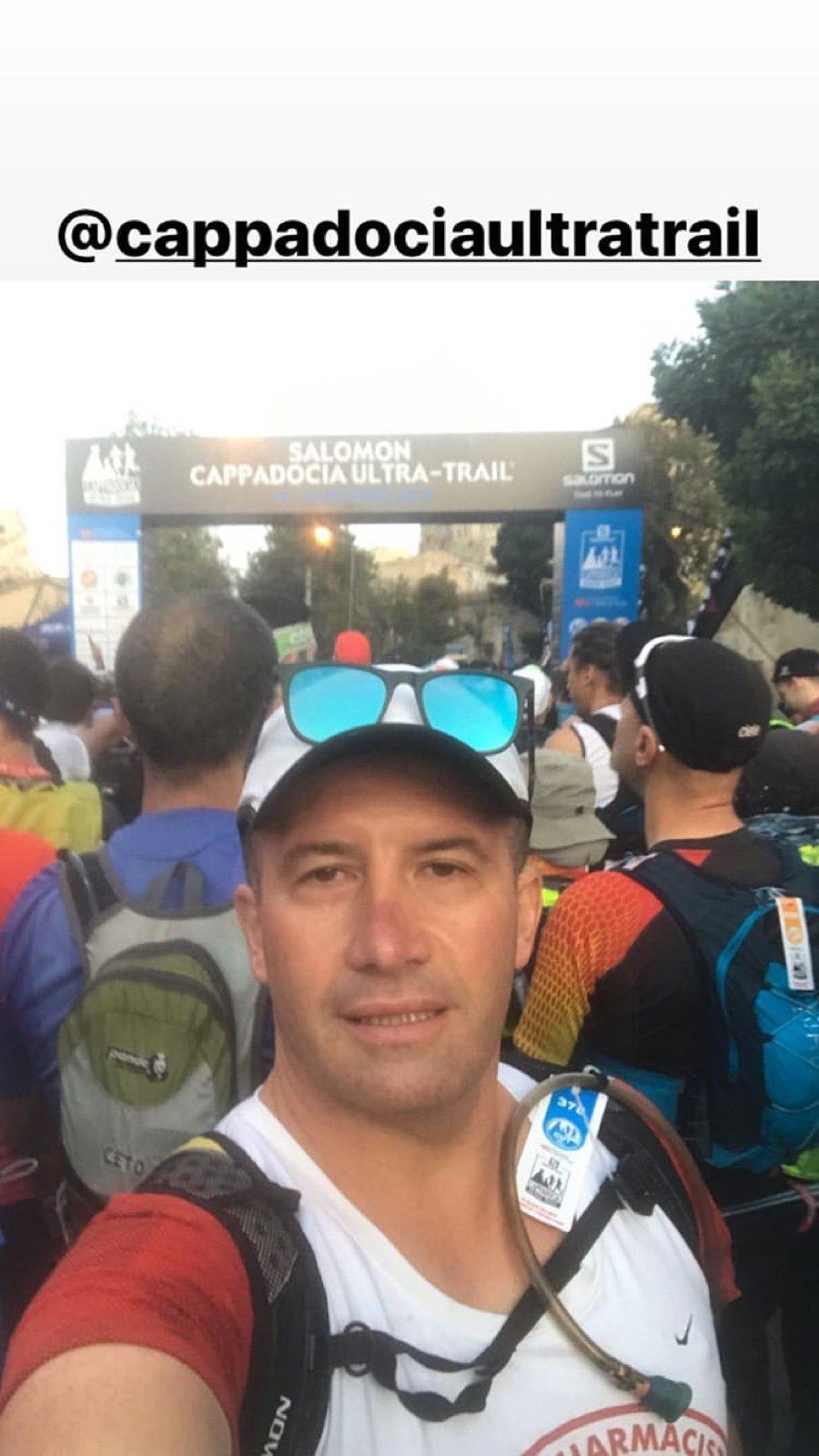 Erden Giritli taking a selfie at the Cappadocia Ultra Trail start area, reflecting his running coach experience